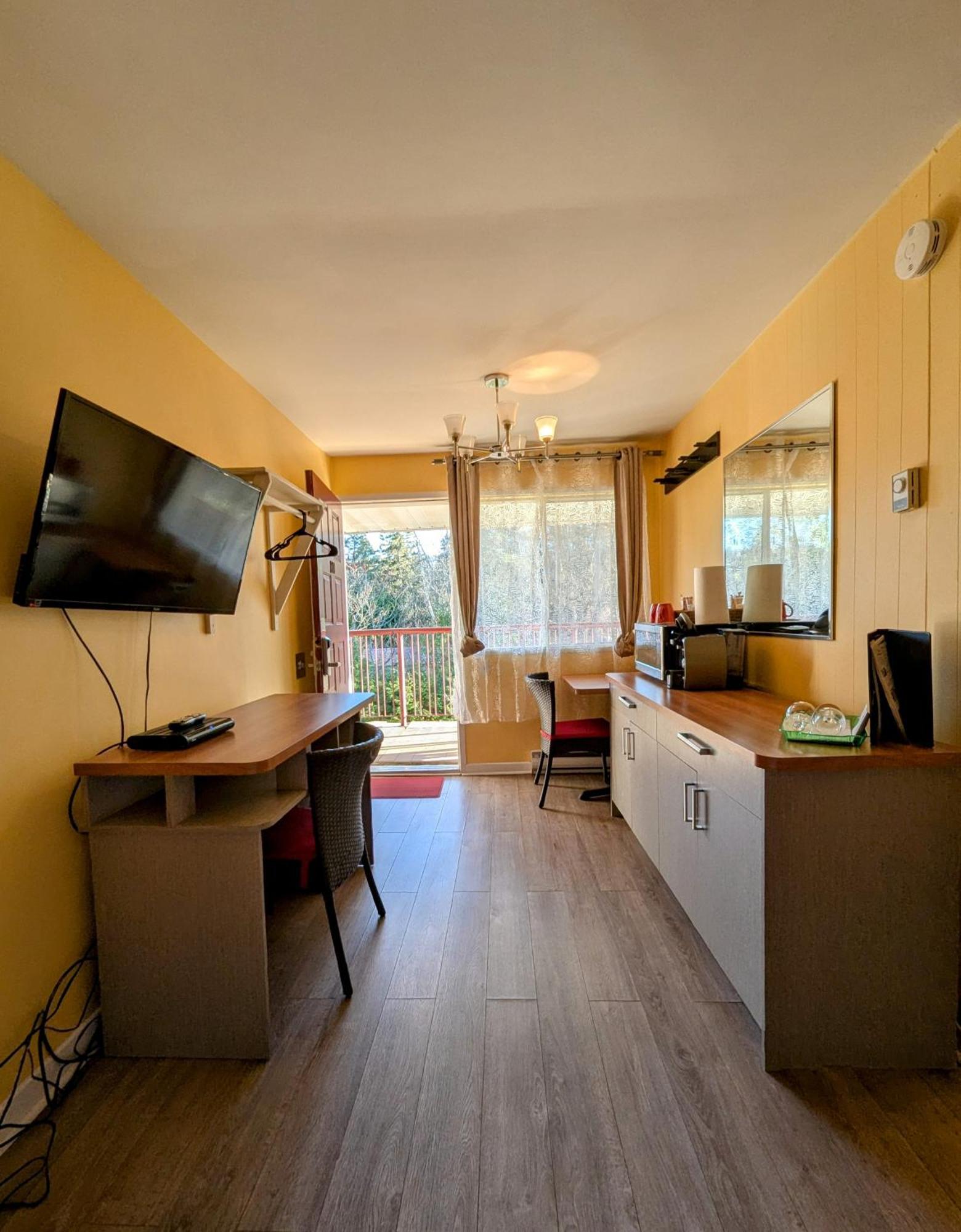 Motel Des Pentes Et Suites Saint-Sauveur Bagian luar foto