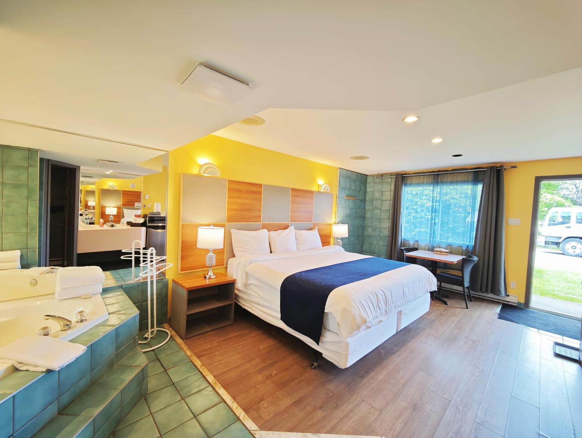 Motel Des Pentes Et Suites Saint-Sauveur Bagian luar foto